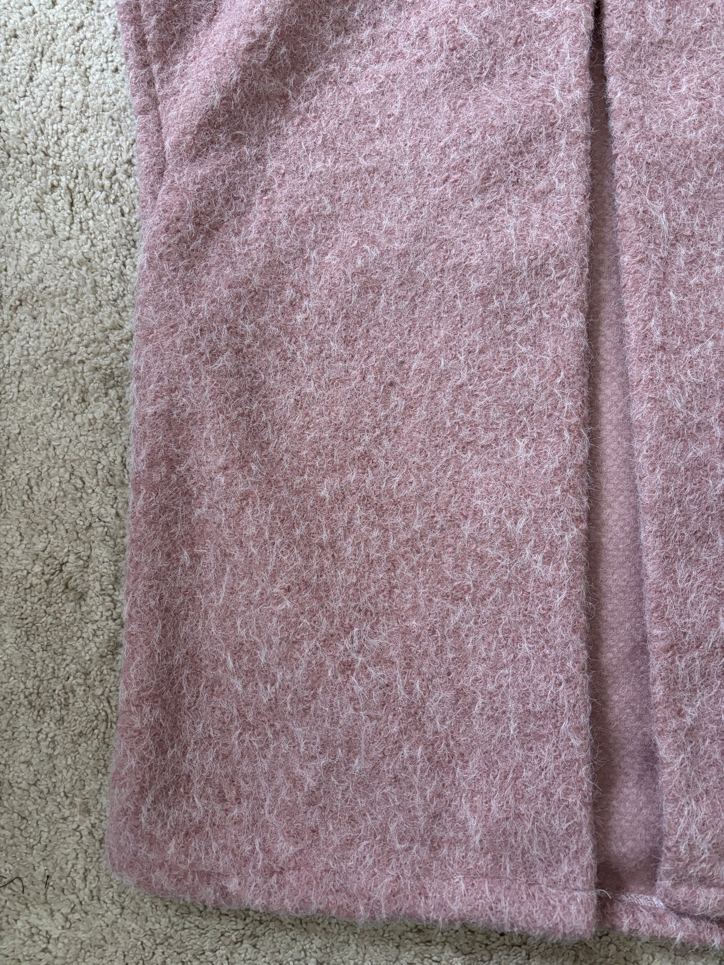 Pink sleeveless vest