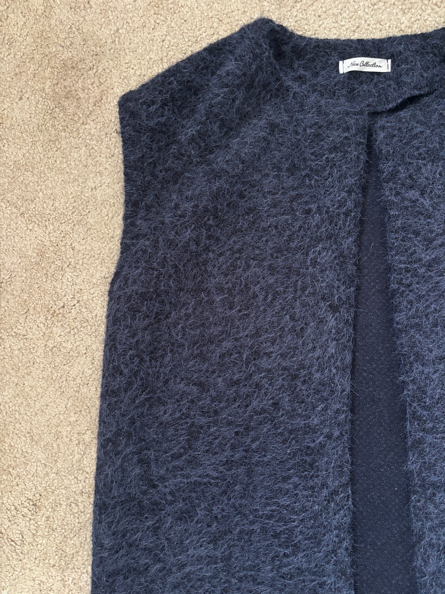 Navy sleeveless vest