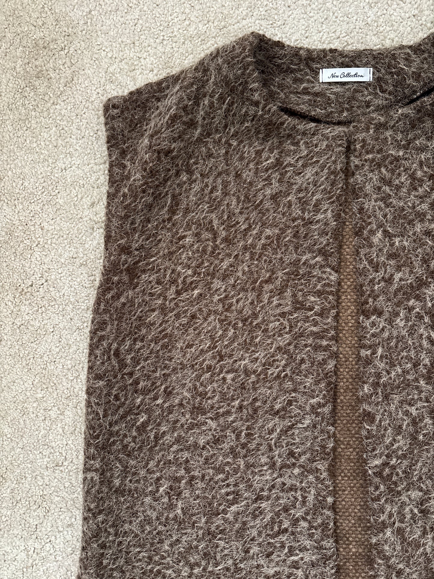 brown sleeveless vest