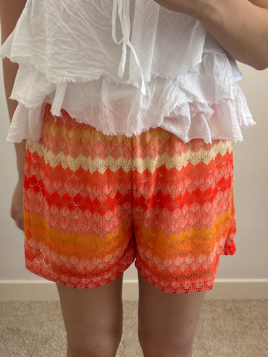 Orange crochet shorts