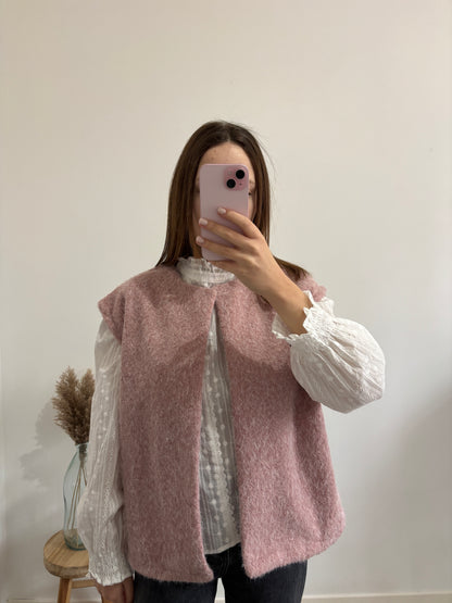 Pink sleeveless vest