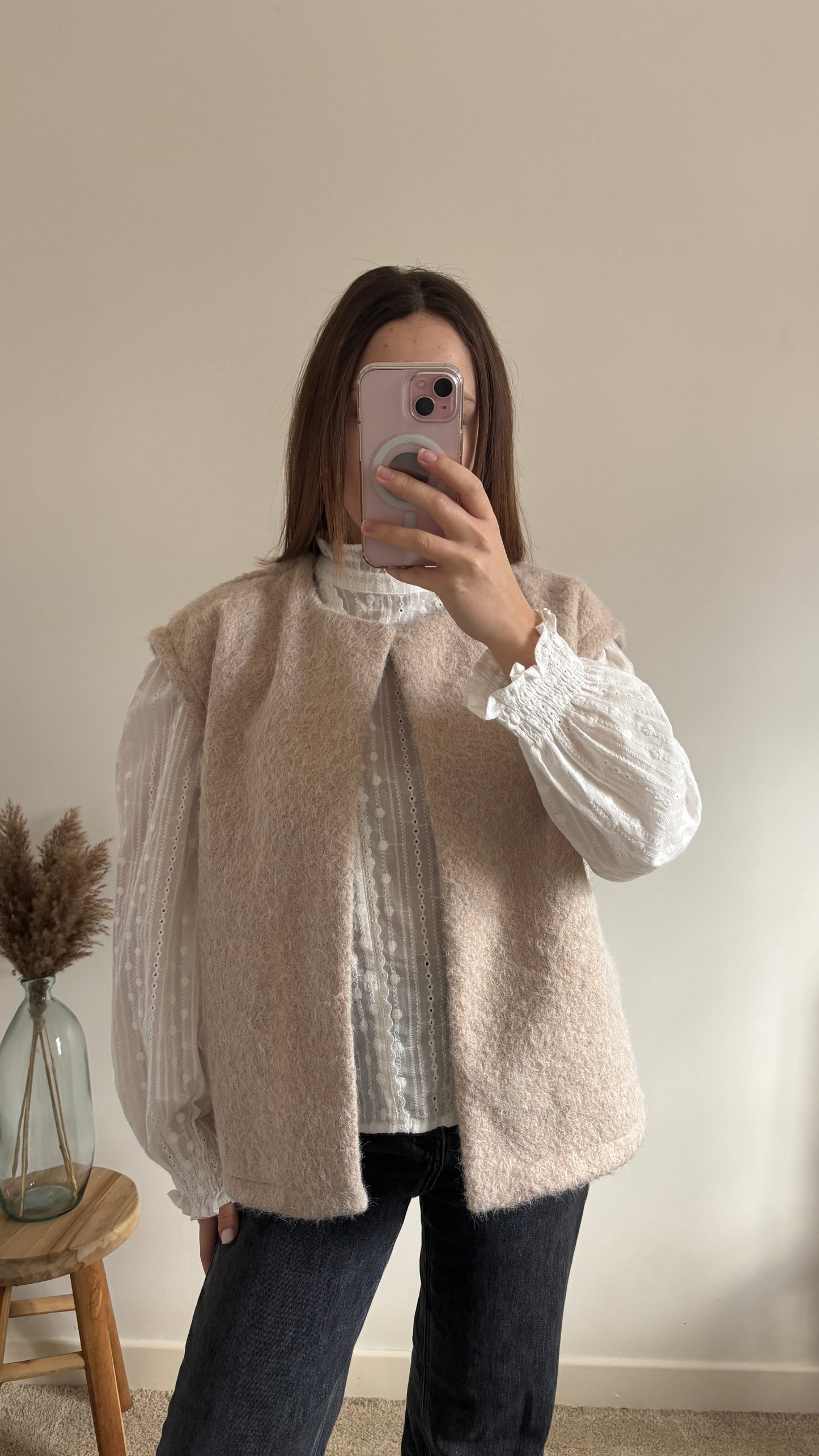 beige sleeveless vest