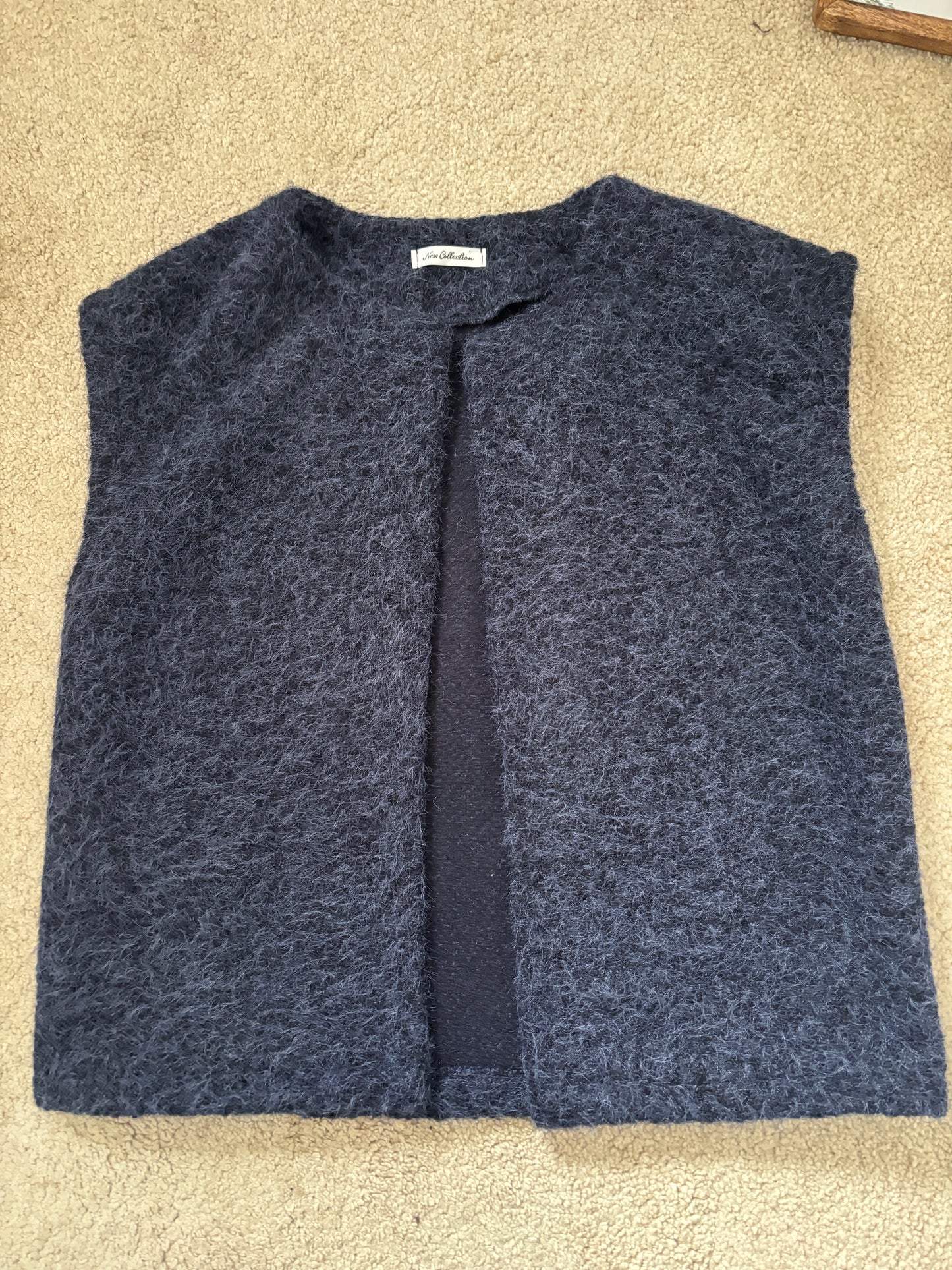 Navy sleeveless vest