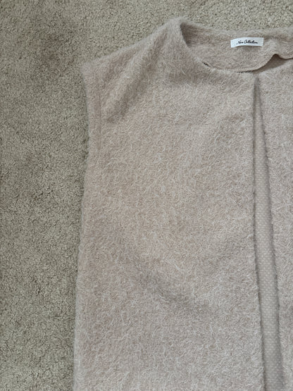 beige sleeveless vest