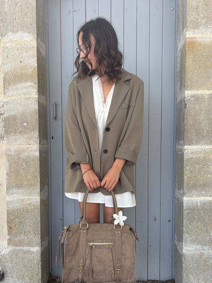 Taupe blazer met asymmetrische achterkant