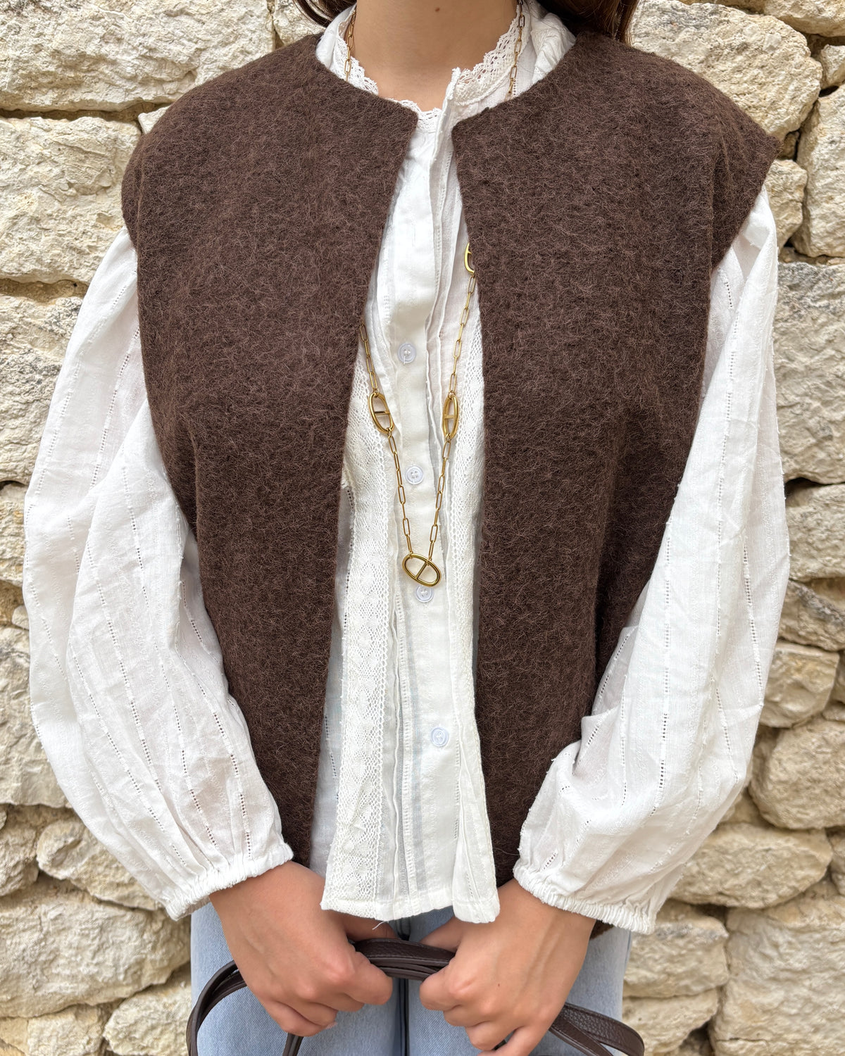 Navy blue sleeveless vest