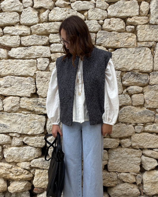 Navy blue sleeveless vest