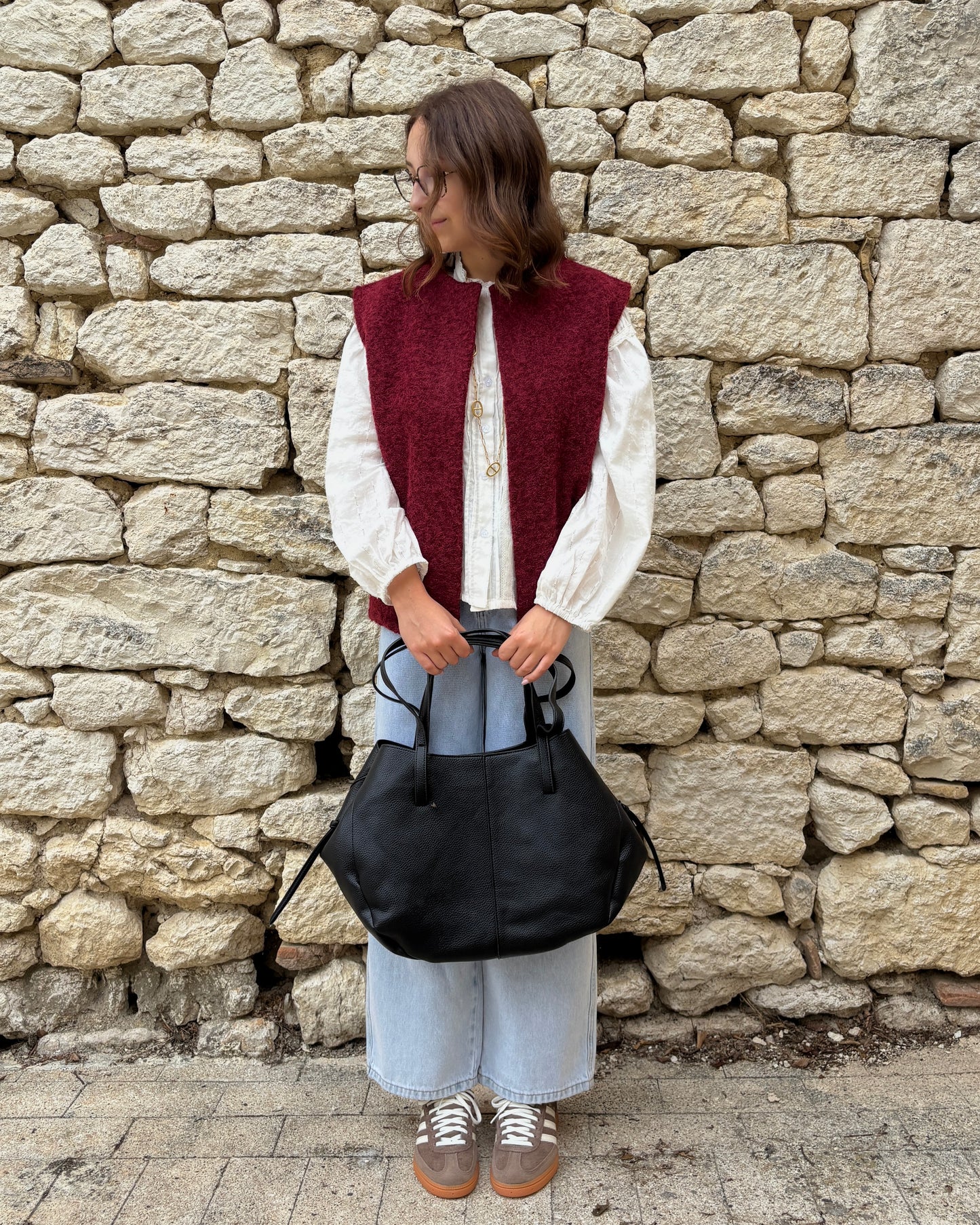 Navy blue sleeveless vest
