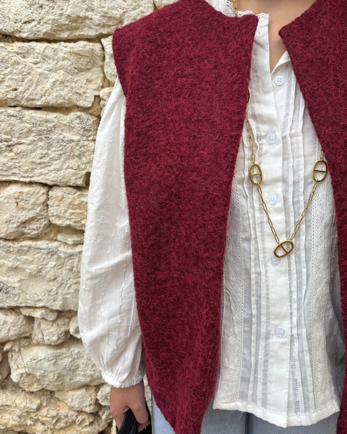Navy blue sleeveless vest