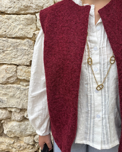 Navy blue sleeveless vest
