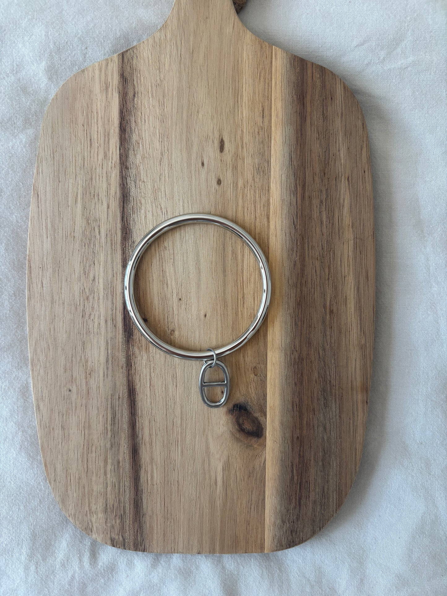 Armband met bedels en zilverkleurige schakels